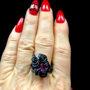 Black metal wired ring